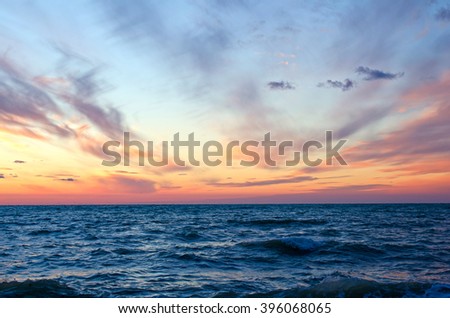 sunset over ocean in summer.Sevastopol,Crimea Royalty-Free Stock Photo #396068065