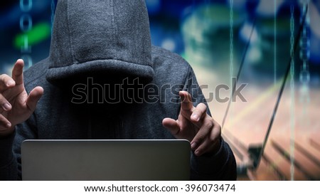 hacker with computer notebook