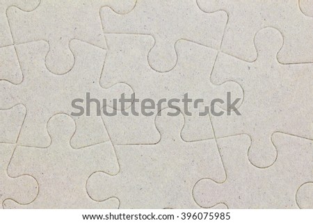 Connected blank jigsaw puzzle pieces as background
