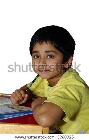 An indian kid doing his home work