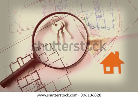Model house, construction plan for house building, keys. Real Estate Concept. 