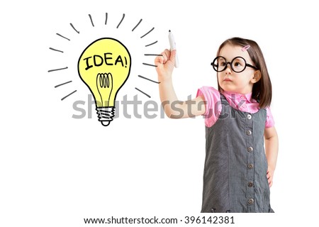 Cute little girl wearing business dress and drawing a light bulb. White background.