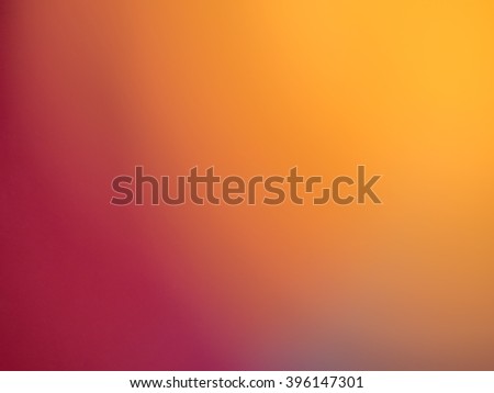 Defocused autumn sunset red orange purple and yellow colors background