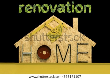 Renovation home. Fixing materials and tools on a sheet of OSB in the form of home. Isolated objects on a black background.