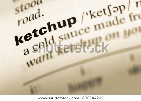 Close up of old English dictionary page with word ketchup