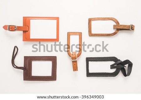 Luggage tags on white background 
