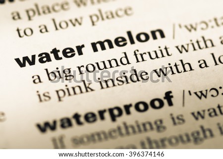 Close up of old English dictionary page with word water melon