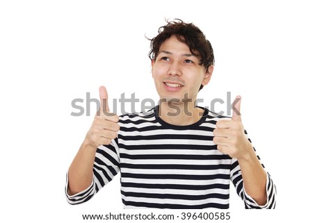 Asian man showing thumbs up sign 