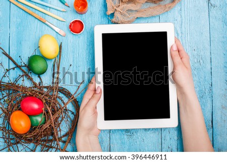 The top view of easter on wooden table office workplace