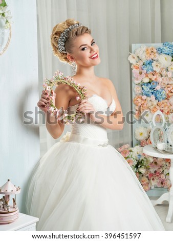 portrait of a beautiful bride. make-up, hairstyle, jewelry.