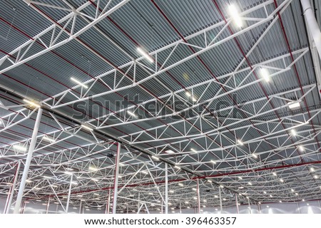 lamps with diode lighting in a modern warehouse Royalty-Free Stock Photo #396463357