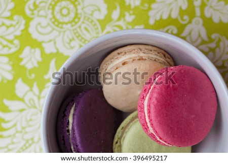 An assortment of French macarons from a Paris bakery - Lavender, Jasmine, Rose, Chocolate, Vanilla