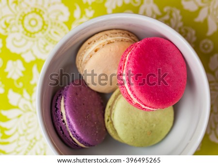 An assortment of French macarons from a Paris bakery - Lavender, Jasmine, Rose, Chocolate, Vanilla