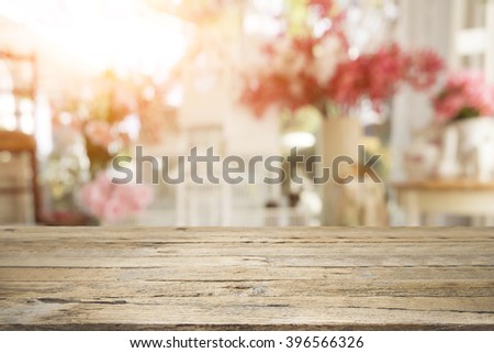 Selective focus empty wooden table or floor on blurred sweet pastel vintage bokeh background. Royalty-Free Stock Photo #396566326