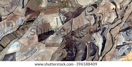 Plowman, allegory, tribute to Picasso, abstract photography of the Spain fields from the air, aerial view, representation of human labor camps, abstract, cubism, abstract naturalism,