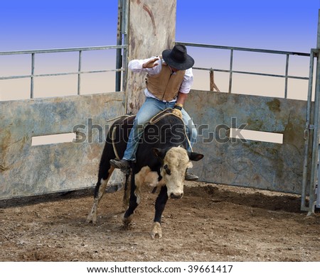 A Bull with Rider Coming out of the Gates partial isolation with clipping path