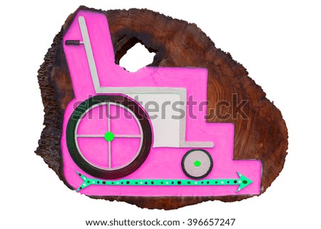 Wheelchair label on wood board, Background have Hot Pink color and Aquamarine arrow pointing to the right side, isolated on white background