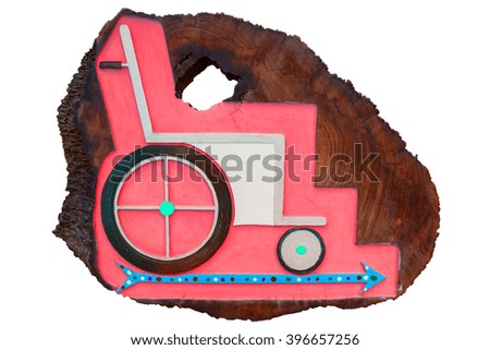 Wheelchair label on wood board, Background have Magenta color and Cyan arrow pointing to the right side, isolated on white background