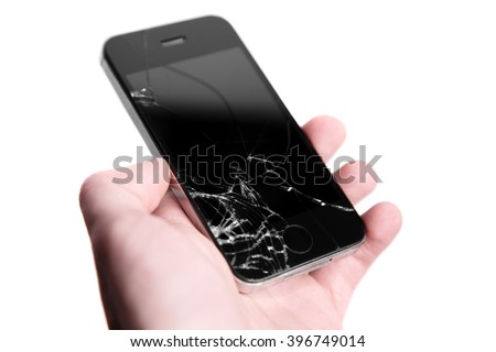 broken crashed glass on phone in hand on white background