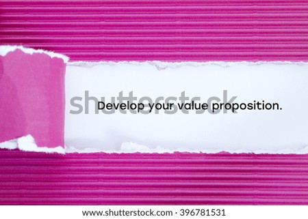 "Develop your value proposition" slogan written under torn paper.
