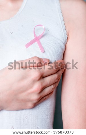 Pink ribbon of breast cancer. Awareness, charity campaign. Symbol of health or illness, support, hope or help. Cause of woman, female disease, survivor. Healthcare or medicine.