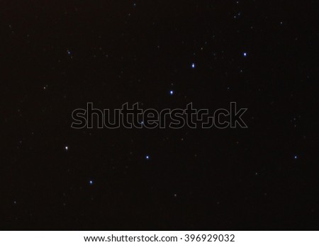 Realistic image of the big dipper surrounded by a few dim stars Royalty-Free Stock Photo #396929032