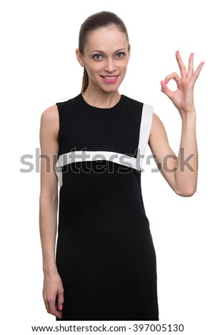 Caucasian woman with ok sign gesture. Isolated on white
