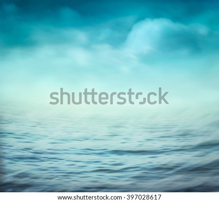 Sea summer abstract background .Blue ocean and cloudscape and sunset in the back.  Summer blur background.. Holiday background