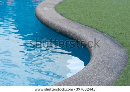 Curve of pool line with grass and copy space