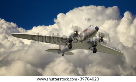 A Shot of a DC3 airplane in flight against a blue sky