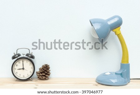 lamp and alarm clock on the table, mock up