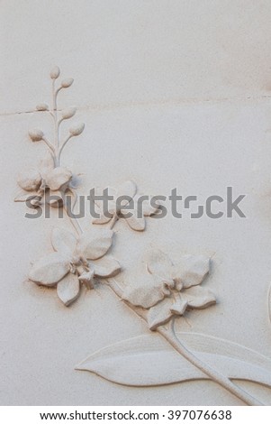 Flowers carved stone walls