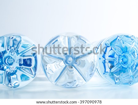 Mineral water bottle bottoms background