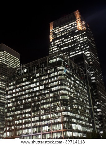 View of Canary Wharf skyscrapers in London at night