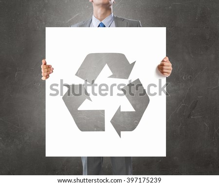 Man presenting recycle concept