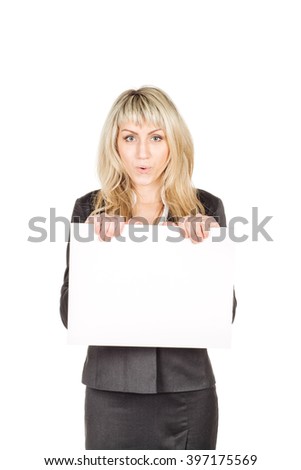 Portrait of young business woman holding a blank banner. image on a white studio background. business and lifestyle concept
