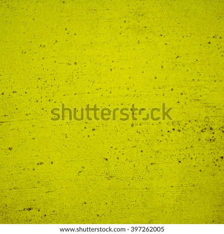 abstract yellow background texture of an old concrete wall