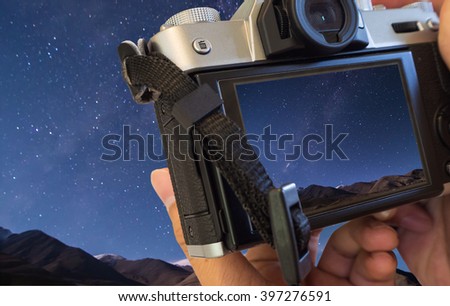 Take a photo by camera, beautiful background of the night sky with stars