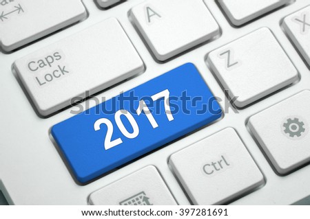 2017  written on Blue button White Keyboard