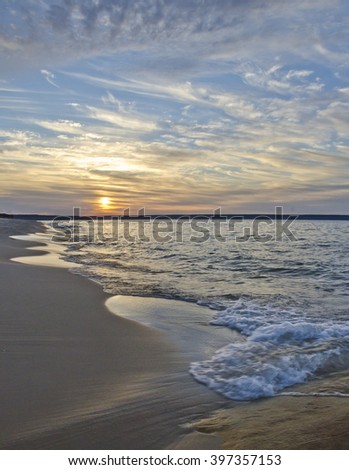 The sun sets over Lake Superior from Miner's Beach, Pictured Rocks National Lakeshore, Alger County, Michigan