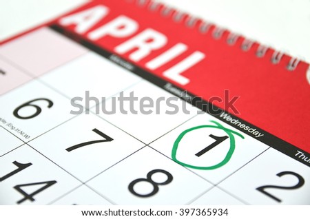 calendar for April  with the First day  ringed in green, Fools day concept. Royalty-Free Stock Photo #397365934