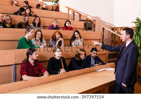Teacher explaining something to students