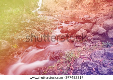 Beautiful waterfall landscape.Waterfall in forest with Vintage effect filtered