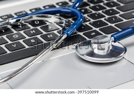 Medical Research, stethoscope on laptop keyboard, doctor workplace