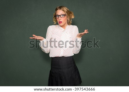 Woman confused clueless helpless unsure puzzled baffled blank funny expression space for print 