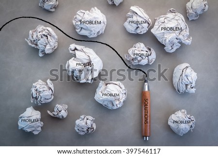 business solution concept with trash paper and pencil line on grey background Royalty-Free Stock Photo #397546117