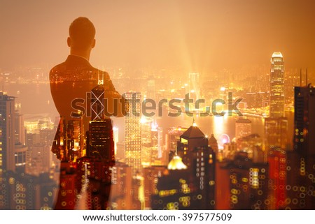 Photo of stylish adult businessman wearing trendy suit and looking night city. Double exposure, panoramic view contemporary City background. Horizontal, bokeh, blurred
