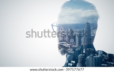 Photo of stylish bearded lawyer wearing trendy suit and looking city. Double exposure, panoramic view contemporary megalopolis background. Space for your business message.  Isolated white. Wide