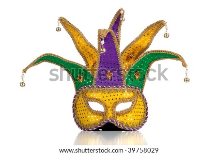 Gold, purple and green glittery mardi gras mask on a white background