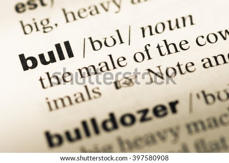 Close up of old English dictionary page with word bull
